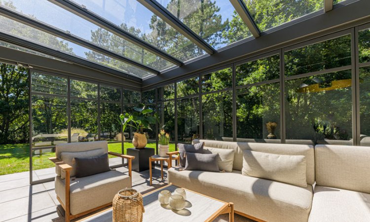 Tuinkamer Excellent met schuifwanden en een uitzicht over de tuin